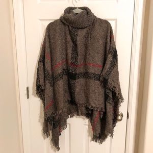 Taupe and black turtleneck sweater poncho